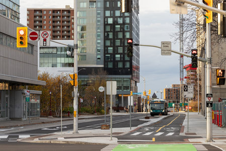 Ottawa, Canada - November 5, 2022: Cityscape with crossroad and traffic lights in downtown. Public...