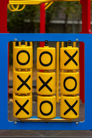 Tic-tac-toe game on the playground. Outdoor activities for children.