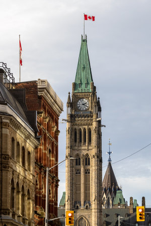 Canadian Parliament building with flag in Ottawa, Canadaのeditorial素材
