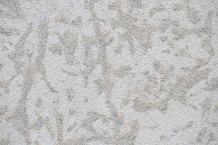 Abstract grunge stone textured grey building wall background