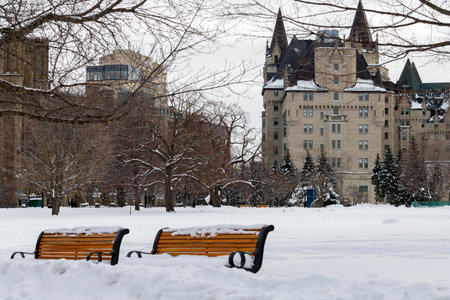 Ottawa, Canada - January 23, 2023: Major's Hill Park and Fairmont Chateau Laurier hotel building in winter.のeditorial素材