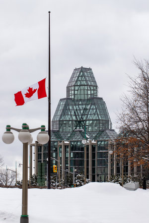 Ottawa, Canada - January 23, 2023: National Gallery of Canada with Canadian flag in winterのeditorial素材