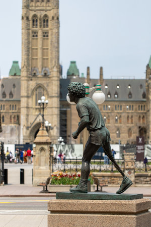 Ottawa, Ontario - May 19, 2023: Terry Fox Statue near Canadian Parliament building.のeditorial素材