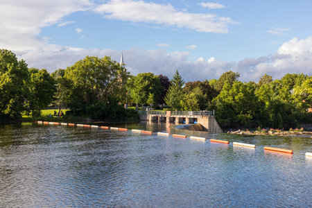 Carleton Place, Canada - August 13 2023: Carleton Place rapids in Ontario. View on river and park in...