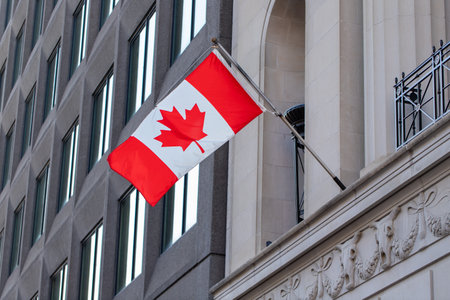 Canadian flag on building in downtown Ottawa, Ontario in Canada
