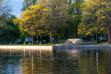 Park with lighted fountains along Rideau River in Smiths Falls town in Ontario, Canada. Centennial Parkの写真素材