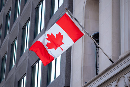 Canadian flag on government building in downtown of Ottawa, Ontario in Canada.の写真素材