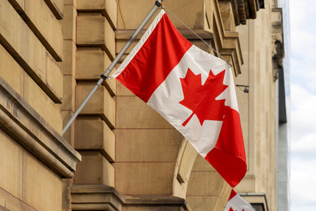 Canadian flag on government building in Ottawa downtown, Ontario in Canadaの写真素材