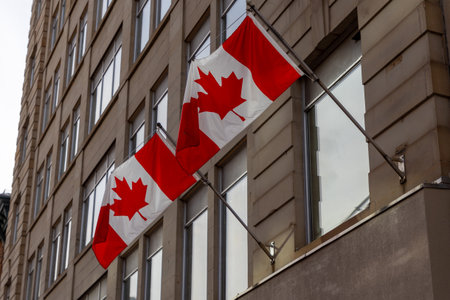 Canadian flags on building in Ottawa downtown, Ontario in Canada.
