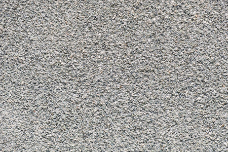 Gray textured stone wall background for design and architectureの写真素材