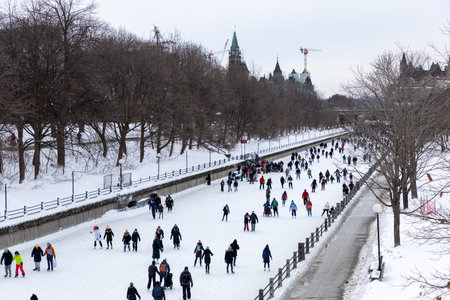 Ottawa, Canada - February 8, 2025: Rideau Canal ice skating rink in downtown of capital city in winter seasonのeditorial素材