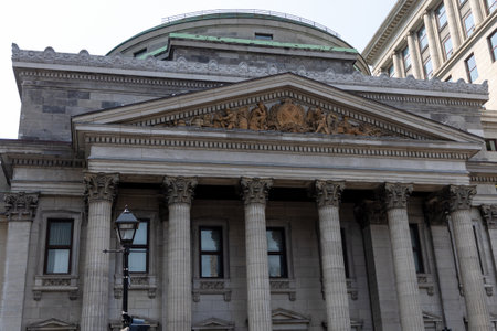 Montreal, Canada - August 2, 2025: Bank of Montreal Head Office building in Old Montreal, Quebec