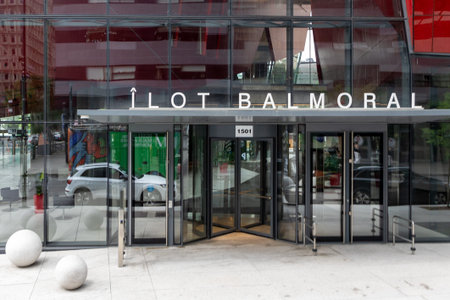 Montreal, Canada - July 5, 2025: Ilot Balmoral building facade, prominent architectural landmark in...