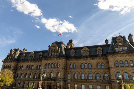 Ottawa, Canada - October 6, 2025: Prime Minister's Office building with Canadian flag in downtownのeditorial素材