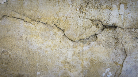 Cement crack wall texture background. Cracked wallの写真素材