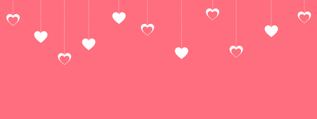 pink valentines day background with hanging white heartsの写真素材