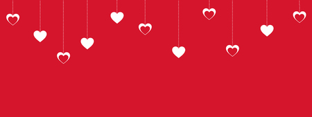 red valentines day background with hanging white heartsの写真素材