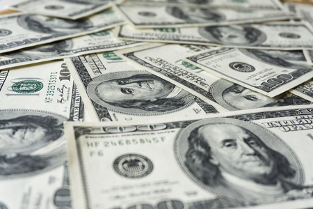 Pile of old one hundred dollar bills bills, close up dollarsの写真素材