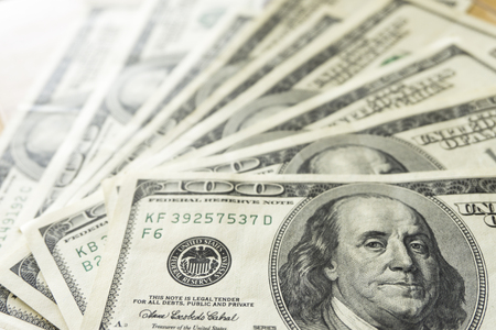 Fan of hundred dollar bills, close upの写真素材