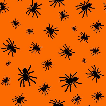 Seamless pattern with black silhouette of spider on orange background. Halloween decorative texture. Pattern for design, web, wrapping paper, fabric.の写真素材