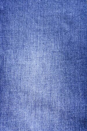 navy jeans fabric plain surface background, denim textile texture.の写真素材