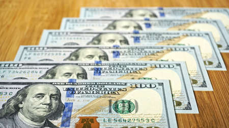 100 old dollar bills. Fan stack close up.の写真素材