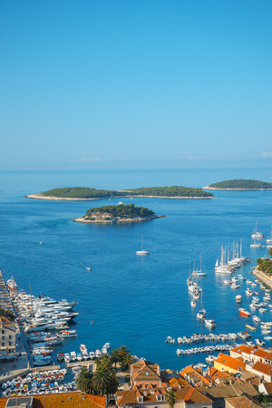Aerial seascape view to turquoise waters of Adriatic Sea in Island Hvar Croatia. Famous sailing travel destination in Croatia, Island Hvar summer scenery in Europe.の写真素材
