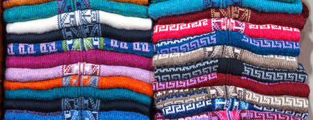 Peruvian traditional colourful native handicraft textile fabric at market in Peru, South Americain. Close up. selective focusの写真素材