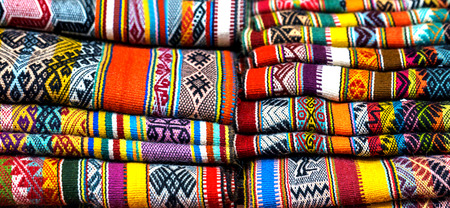 Peruvian traditional colourful native handicraft textile fabric at market in Peru, South Americain. Close up. selective focusの写真素材
