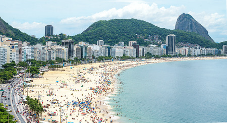 Rio de Janeiro, Brazil - 01.01.2019 Copacabana beach in Rio de Janeiro, Brazil. Aerial view of famous Copacabana sandy Beach with turquoise water and sidewalk mosaic with palms. Top view, horizontalのeditorial素材