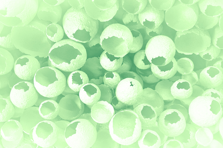 Cracked eggs pattern as colorful green background. Top view, flat lay, selective focus. Easter creative minimal concept. Eggshell texture for art background.の写真素材