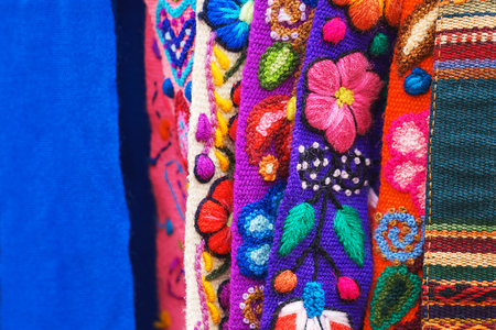Peruvian traditional colourful native handicraft textile fabric at market in Machu Picchuの写真素材