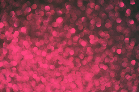 Blurred bokeh dark pink purple coral and blackの写真素材