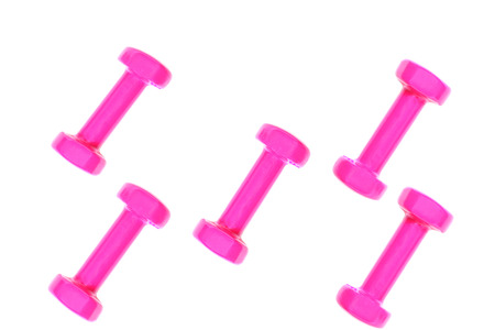 Pink dumbbell pattern on white  with copy space, isolated.の写真素材