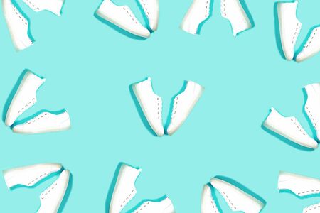Fashion white sneakers pattern on pastel neo mintの写真素材