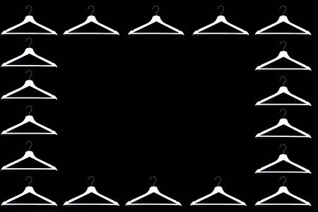 Fashion clothes hanger pattern on blackの写真素材
