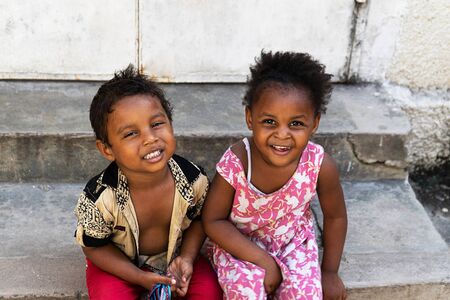 Tanzania, Zanzibar - January 21, 2020: african children playing and posing for a photograph.のeditorial素材