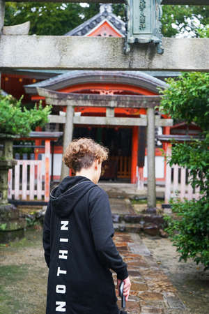 Kyoto, Japan - 03.17.20 Street life portrait of amazing fashion tennager, in Kyoto, Japan.のeditorial素材