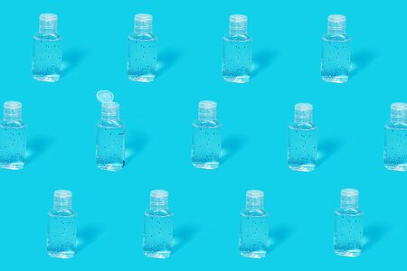 Hand sanitizer pattern, one bottle is opened. Sanitizer gel. Coronavirus prevention hand hygiene. Corona Virus pandemic protection by cleaning hands. Outbreak of coronavirus concept. Novel virus - COVID-19, 2019-nCoV.の写真素材