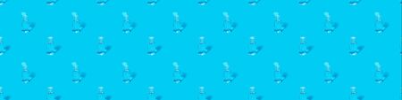 Hand sanitizer gel pattern on blue background. Coronavirus prevention hand hygiene. Corona Virus pandemic protection by cleaning hands. Outbreak of coronavirus concept. Novel virus - COVID-19.の写真素材
