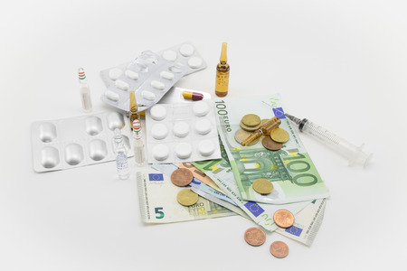 composition with euros, bullets, drugsの写真素材