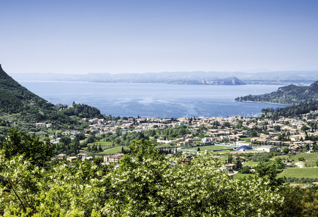Garda lake and Garda city views from the surrounding hillsの写真素材