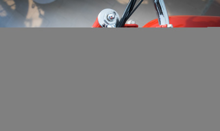 speedometer of a vintage red motorcycleの写真素材