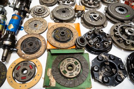 Background formed by spare parts of old vintage cars.の写真素材