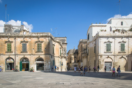 Lecce, Italy - August 6, 2014: Detail of the buildings in baroque style in Cathedral Square, Lecce.のeditorial素材
