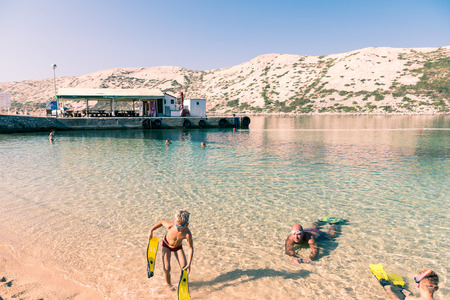 Rab, Croatia - August 9, 2015: Snorkeling in the clear waters of the island of Rab, Croatia.のeditorial素材