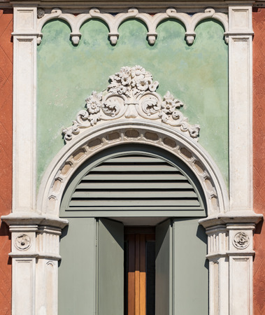Detail of a window in Venetian Gothic style of an old Italian palace.のeditorial素材