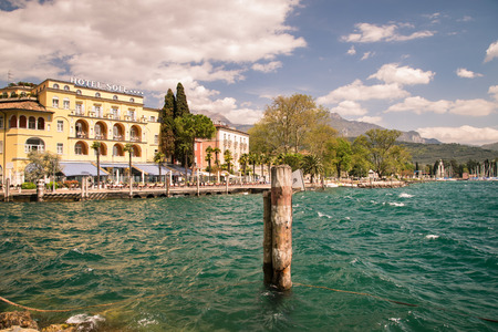 Riva del Garda, Italy - April 15, 2016: The town of Riva del Garda seen from the lake.のeditorial素材