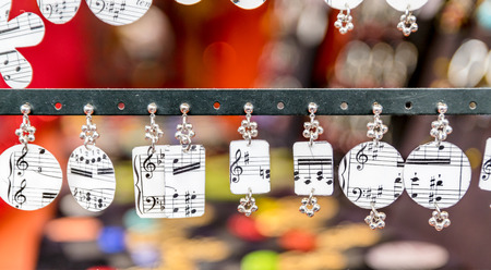 Fashion accessories with black musical notes on white background.の写真素材