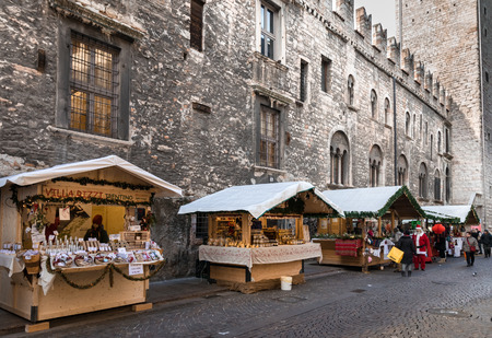 Trento, Italy - December 15, 2015: Typical stalls of the Christmas markets in Trento, Italy.のeditorial素材